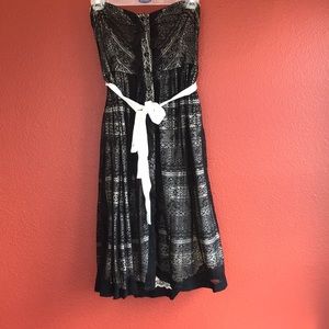 Anthropologie black lace strapless dress.